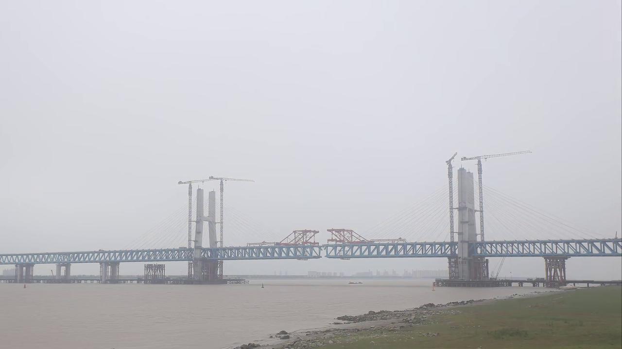 Video thumbnail for China: Major bridge deck completed linking Shanghai island to mainland.