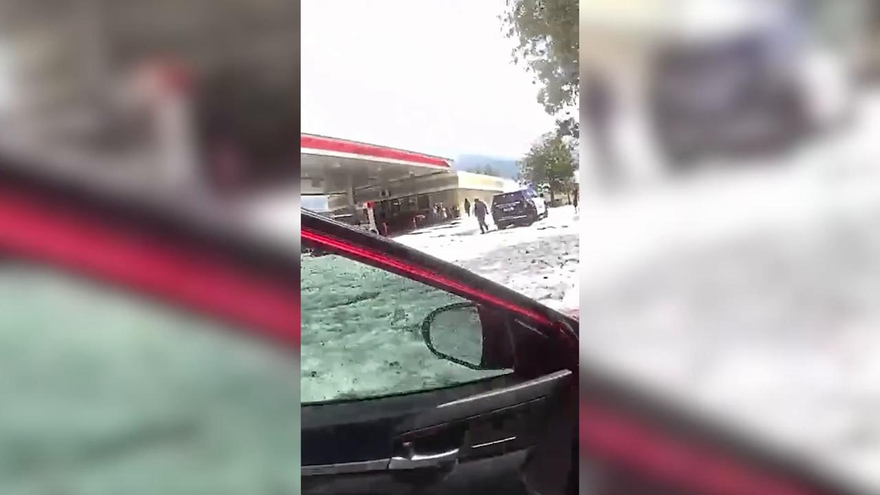 Video thumbnail for US: Bodycam footage shows police rescuing woman from flooded vehicle in Colorado.