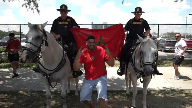 Video thumbnail for US: Moroccans celebrate historic World Cup quarterfinal berth after 3-0 win over Canada.