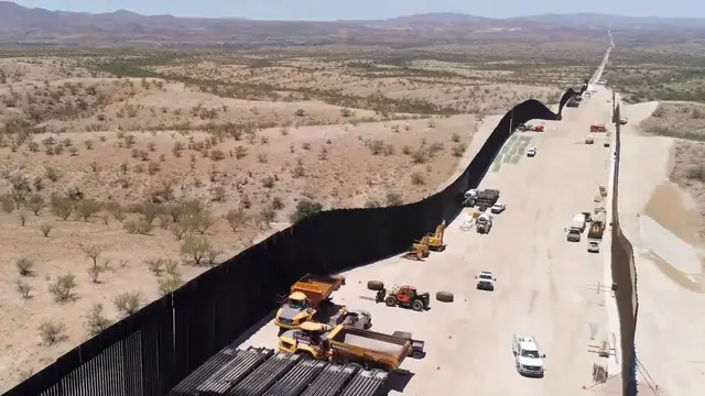 Video thumbnail for US: Trump Builds New Border Wall System With Massive Access Roads In Arizona USA.
