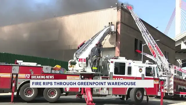 Video thumbnail for At least 10 firefighters injured battling Greenpoint warehouse blaze