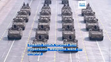 'Video thumbnail for China unveils new weapons at Victory Day military parade attended by Putin and Kim'