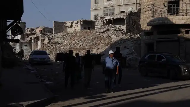 Video thumbnail for Syria: Aleppo residents carry on amid civil war ruins.