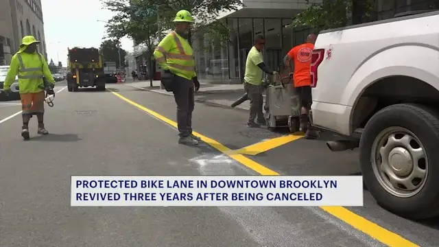 Video thumbnail for City begins work on protected bike lane after 3-year delay