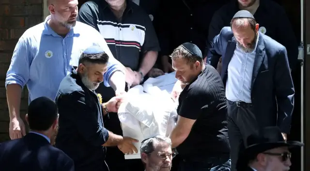 Video thumbnail for Youngest Bondi victim laid to rest as Australia vows tougher hate laws