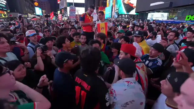 Video thumbnail for US: Spain fans perform Viking rowing celebration in Times Square after World Cup final victory.