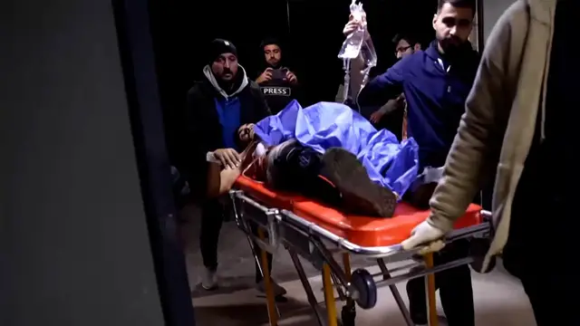 Video thumbnail for Injured arrive at Aleppo hospital amid intense artillery fire