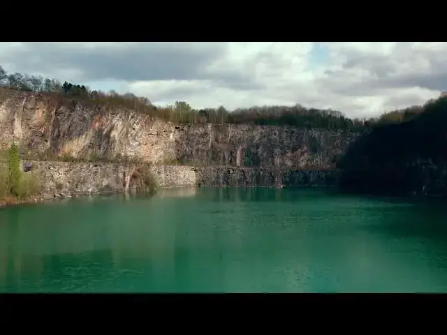 Video thumbnail for Aerial View of Lake and Cliffs