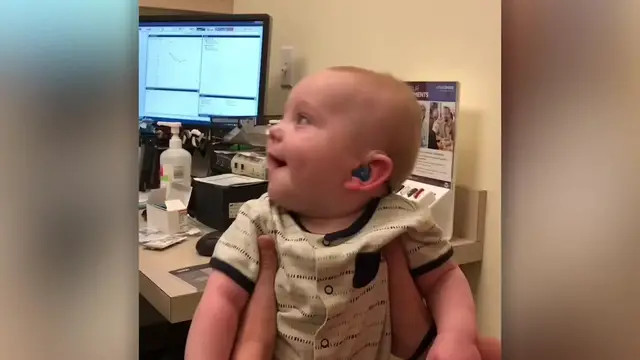 Video thumbnail for Baby Beams With Joy As Hearing Aid Activated And Hears Parents Speak | Happily TV
