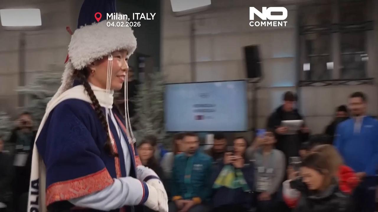 Video thumbnail for Olympians turn runway models as IOC unveils teams' uniforms