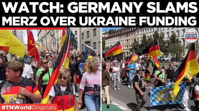 Video thumbnail for 'MERZ MUST GO!' Munich Protesters Rally Against Ukraine Support and Defence Spending