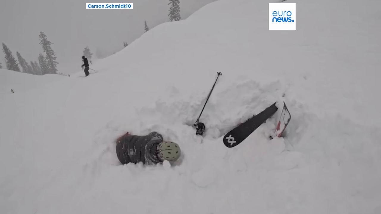 Video thumbnail for Dramatic rescue: Skier pulled alive from deep snow in California