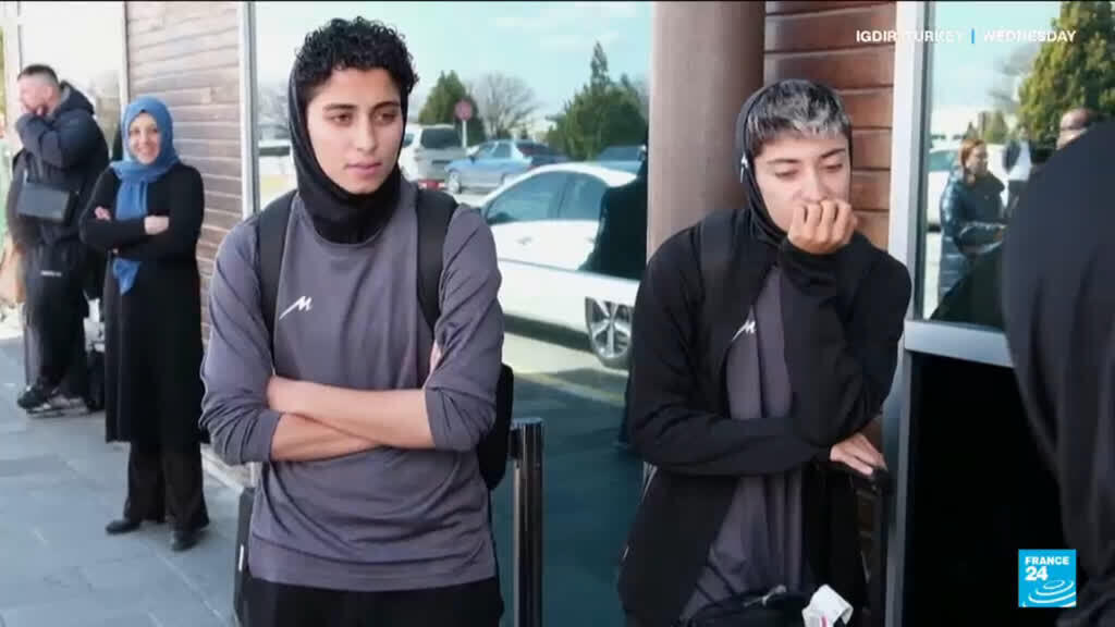 Video thumbnail for Iran women's football team return after asylum tussle