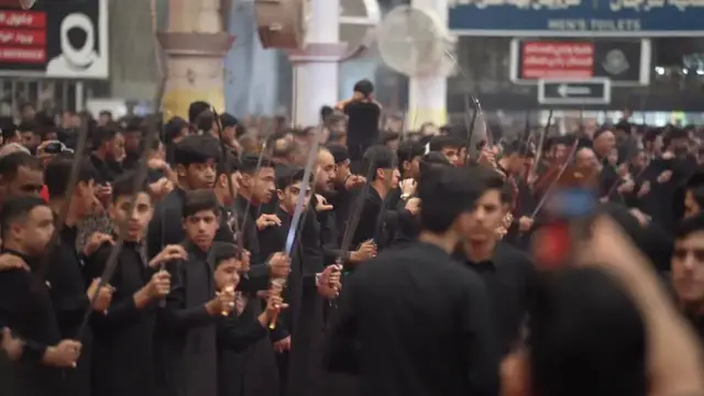 Video thumbnail for Iraq: Najaf's Imam Ali Shrine hosts Muharram mourning ceremony.