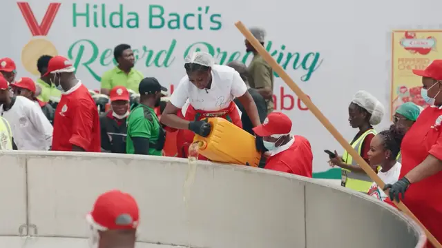 'Video thumbnail for Largest serving of Nigerian style jollof rice - 8,780 kg (19,356 lb 9 oz) by Hilda Baci and Gino'