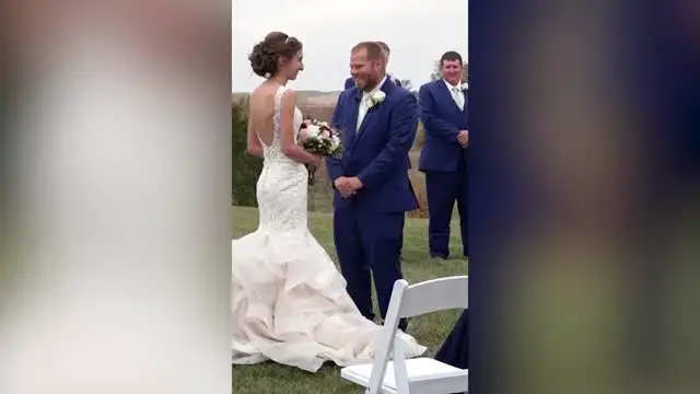 Video thumbnail for Groom Goes Viral After Wrapping His Shivering Bride In Suit jacket During Outdoor Wedding | Happily TV
