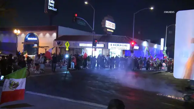 Video thumbnail for US, Los Angeles: East Los Angeles Fans Celebrate Mexico Soccer Victory On Whittier Boulevard Part 2.