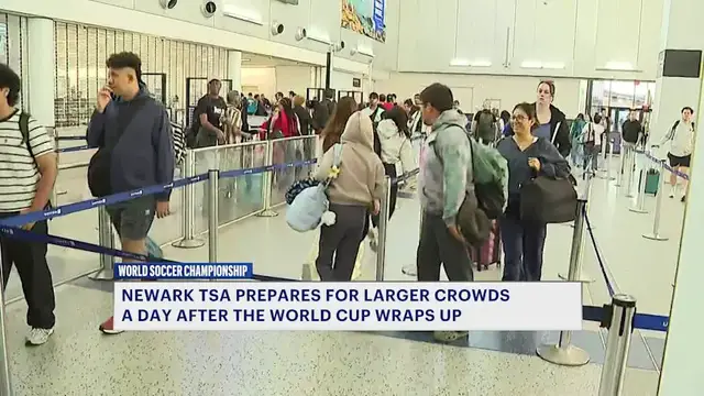 Video thumbnail for World Cup fans fill Newark Airport as thousands head home after final