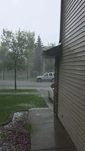 Video thumbnail for Record Rain and Hailstorm Slams South Edmonton Streets