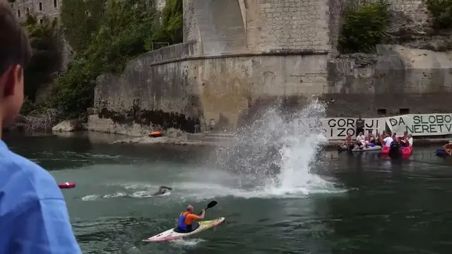 Video thumbnail for Bosnia and Herzegovina: Bosnia's Mostar hosts 460th traditional bridge diving competition.