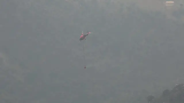 Video thumbnail for Spain: Aerial crews combat wildfire in Spain’s Sierra de Espadan.