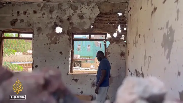'Video thumbnail for Khartoum displacement: Residents return to destroyed homes'