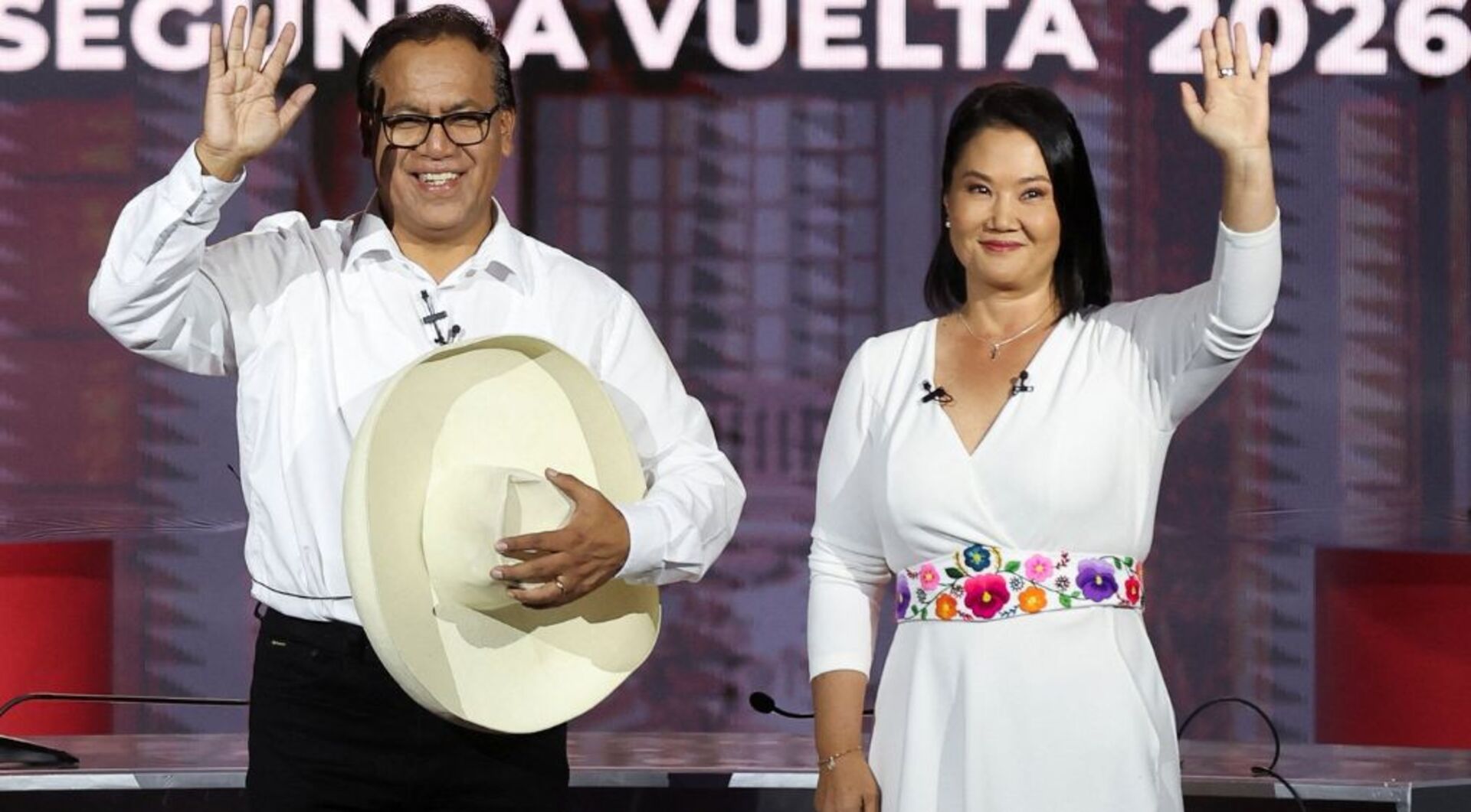 Video thumbnail for Peru election: Fujimori and Sanchez clash in decisive debate with a quarter of voters undecided