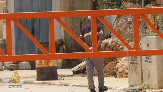 'Video thumbnail for Israeli separation wall: Besieging a village in the occupied West Bank'