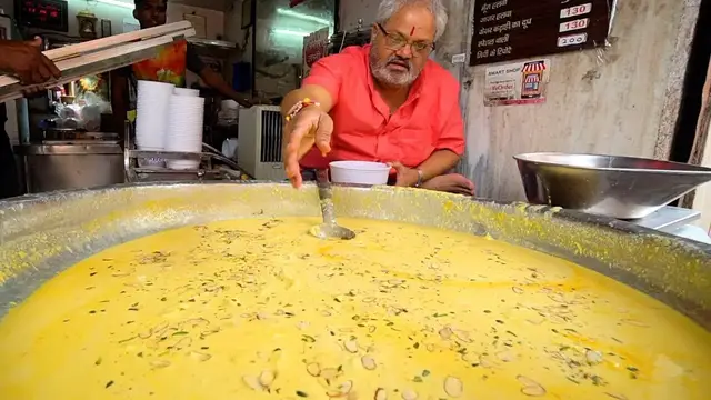 'Video thumbnail for LASSI KING of INDIA | Indian Street Food Tour in Jaipur, India - BEST Street Food in India + CURRY'