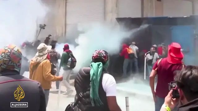 Video thumbnail for Protests overshadow Mexico City as World Cup opening nears