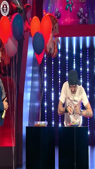 Video thumbnail for Most balloons passed through the nose and out the mouth in one minute