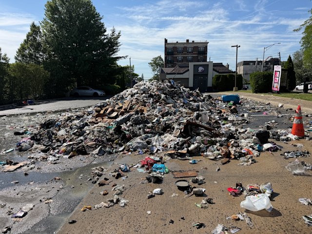 Video thumbnail for Garbage truck fire leaves trash piled at Taco Bell in New Rochelle