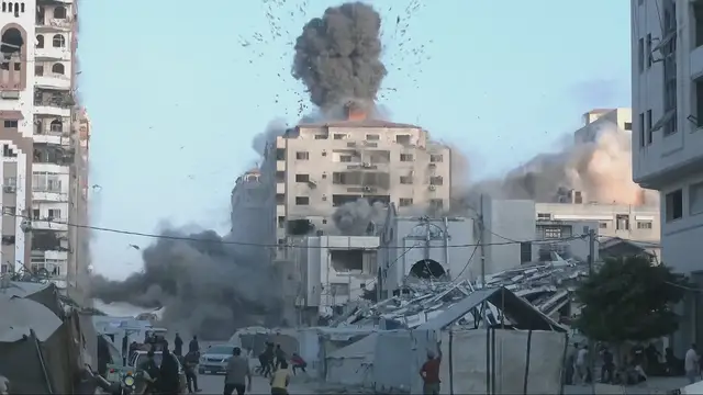 'Video thumbnail for Israeli army hits high-rise building in Gaza City after issuing forced evacuation orders'