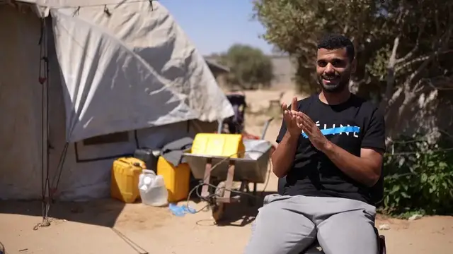 Video thumbnail for From pitch to tent: A Gaza footballer's World Cup dream interrupted.