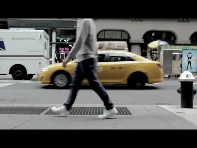Video thumbnail for People Walking by on a Sidewalk