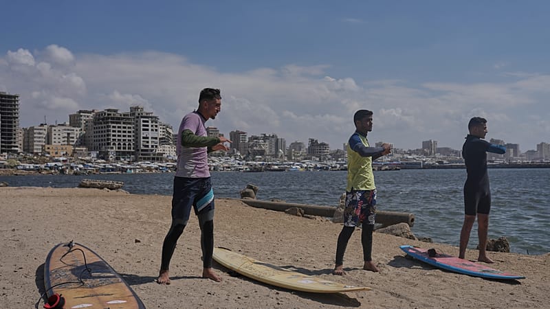 Video thumbnail for Surfers in war-torn Gaza find rare moments of joy taking to the waves