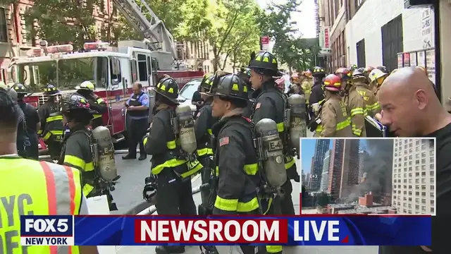 'Video thumbnail for UES building fire: Resident heard apparent blast before seeing smoke'