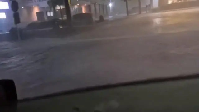 Video thumbnail for US: Cars Navigate Flooded Streets as Heavy Rain and Strong Winds Batter Florida After Hurricane Isaias.