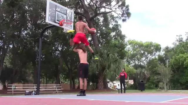 'Video thumbnail for DESTROYING THESE DUNKS :: 6'1 Isaiah Rivera and 6'2 Luis Rivera :: 9'9.5" Rim'