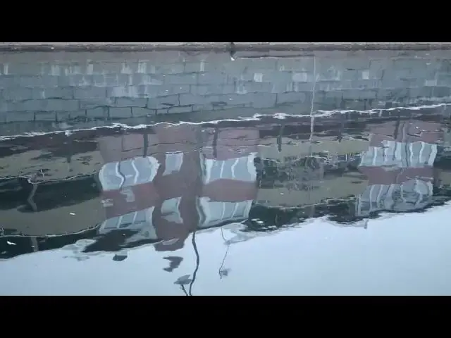 Video thumbnail for River water reflections in town