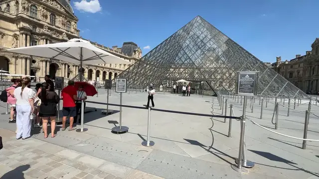 Video thumbnail for France: Extreme heat prompts early closure of Louvre Museum in Paris.