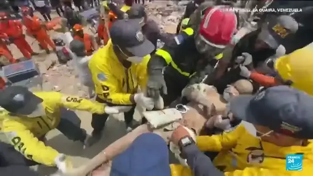 Video thumbnail for Venezuela earthquakes: Father and son rescued as international teams help search