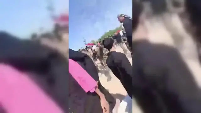 Video thumbnail for Iraq: Iraqi Forces Remove Iranian Flags From Baghdad Pilgrims.