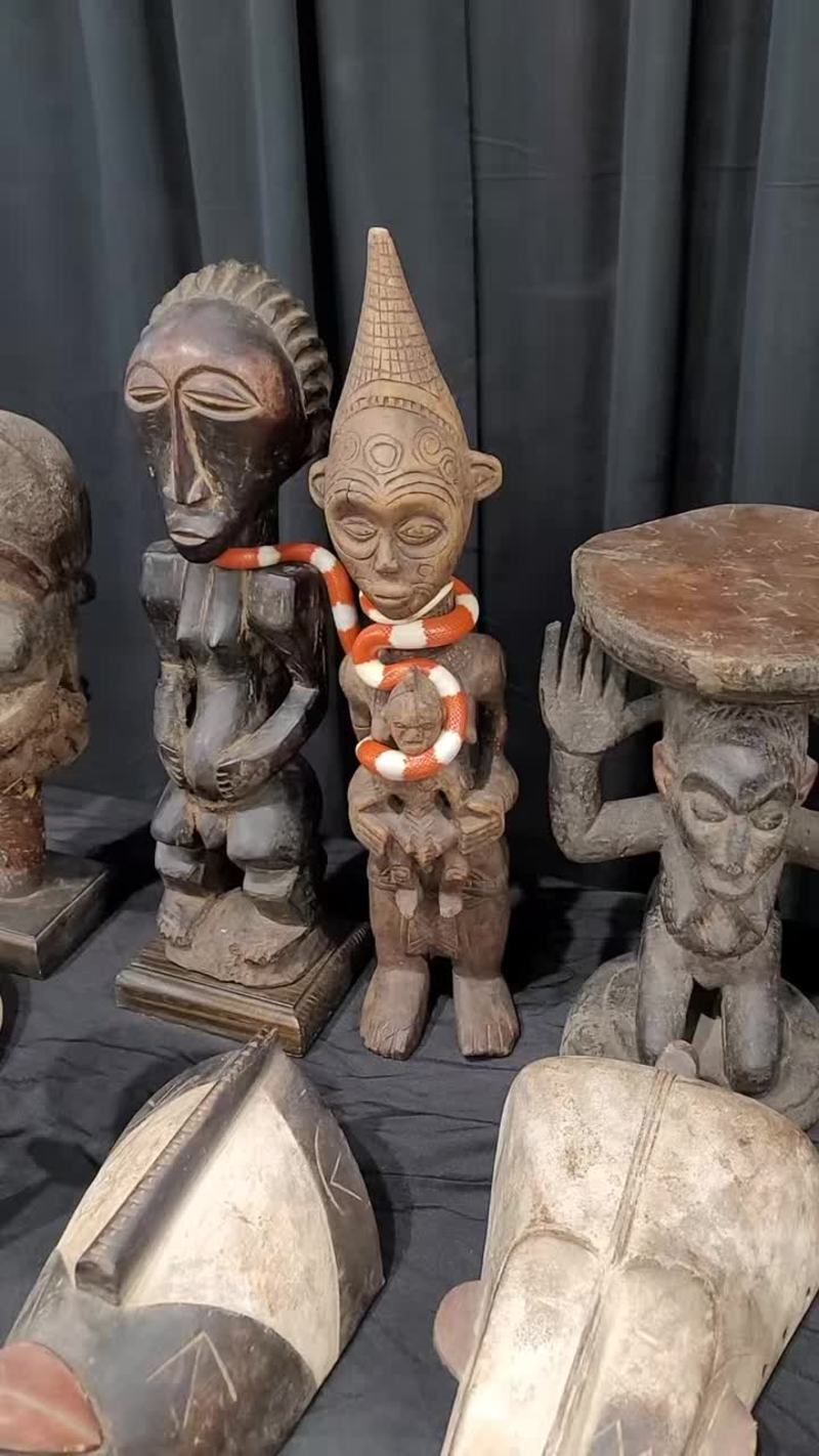 Video thumbnail for Milk Snake Exploring African Tribal Art Display