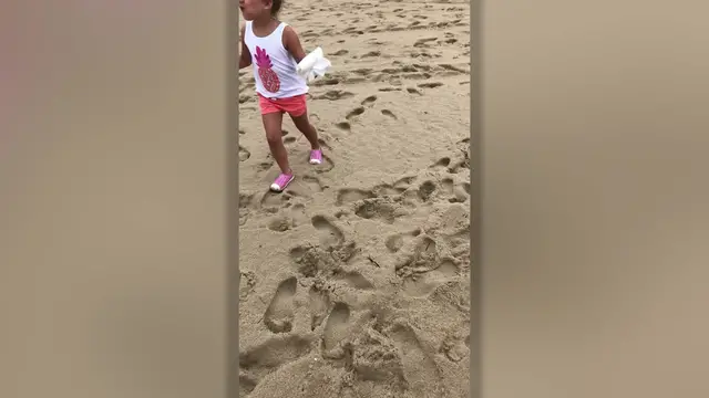 Video thumbnail for Girl's Random Act Of Kindness For Rain Lashed Lifeguard | Happily TV