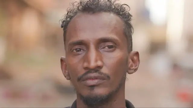 'Video thumbnail for Voices of Sudan: Shopkeeper buries the dead amid civil war, offering closure to families'