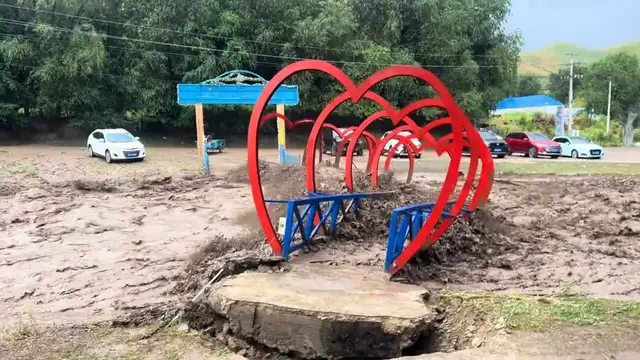 Video thumbnail for Flash Flood Wrecks Yining Scenic Park in Xinjiang