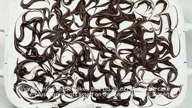 Video thumbnail for Marshmallow Chocolate Poke Cake Recipe