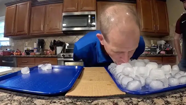 Video thumbnail for Most ice cubes moved by mouth in one minute - 1.661 kg (58.49 oz) by David Rush