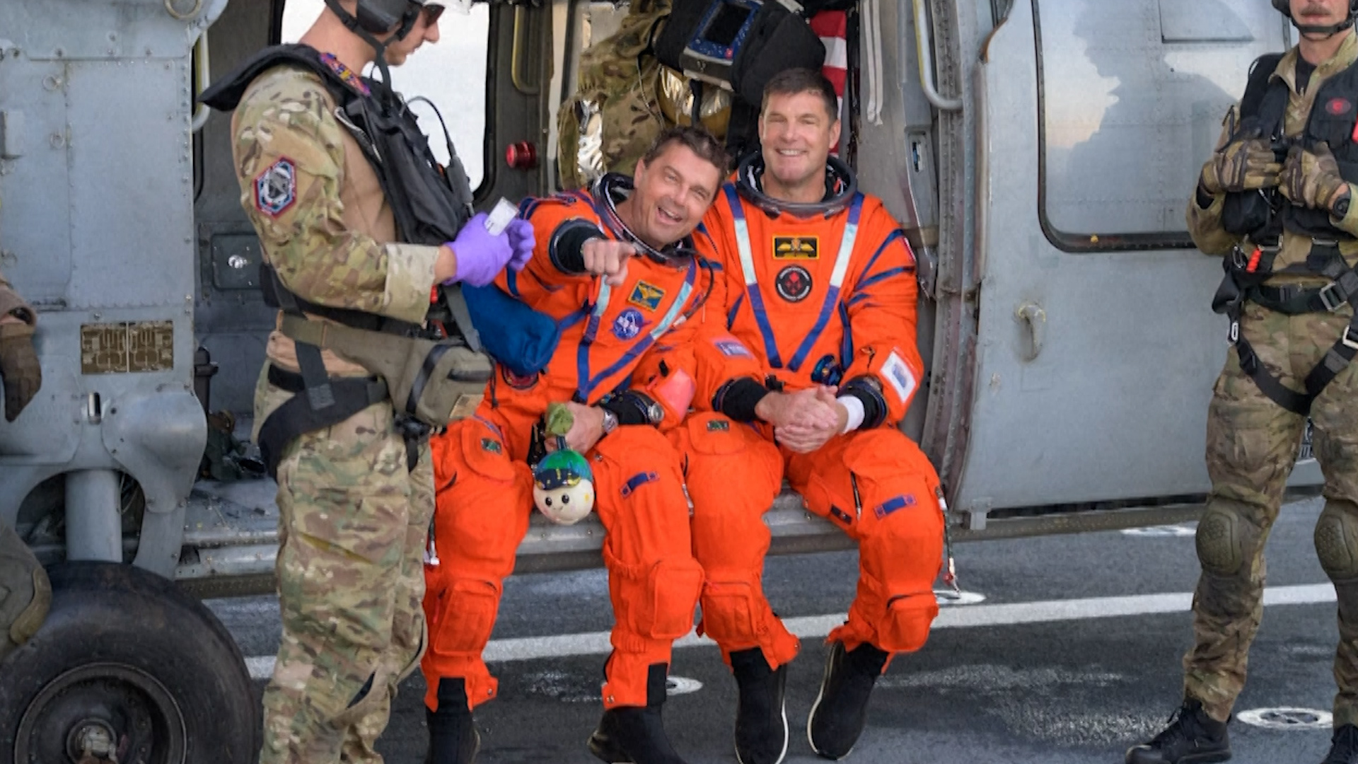 Video thumbnail for Artemis II crew seen on recovery ship after moon mission return